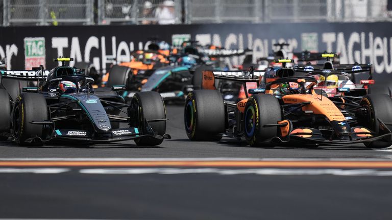 Kimi Antonelli and Lando Norris battle into Turn One at the Madring