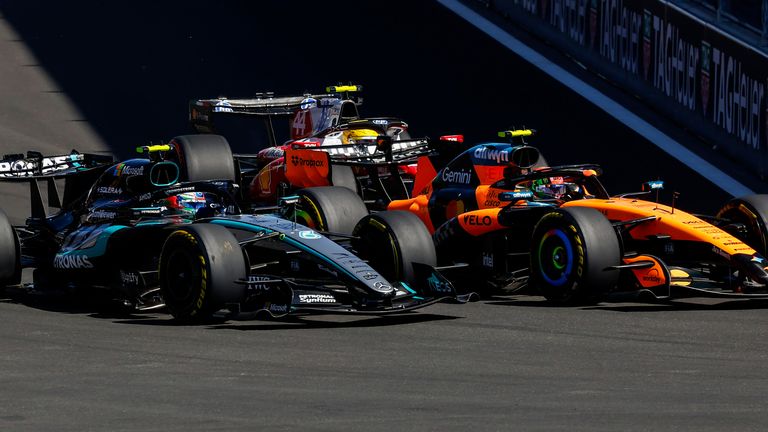 Norris, Antonelli and Hamilton battle into the first corner at the Madring in 2026