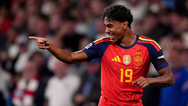 Lamine Yamal celebrates scoring against England