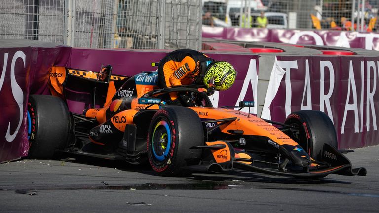 McLaren driver Lando Norris of Britain gets out of his car after a crash during the Azerbaijan F1 Grand Prix auto race, in Baku, Azerbaijan, Saturday, Sept. 26, 2026. (AP Photo/Darko Bandic)