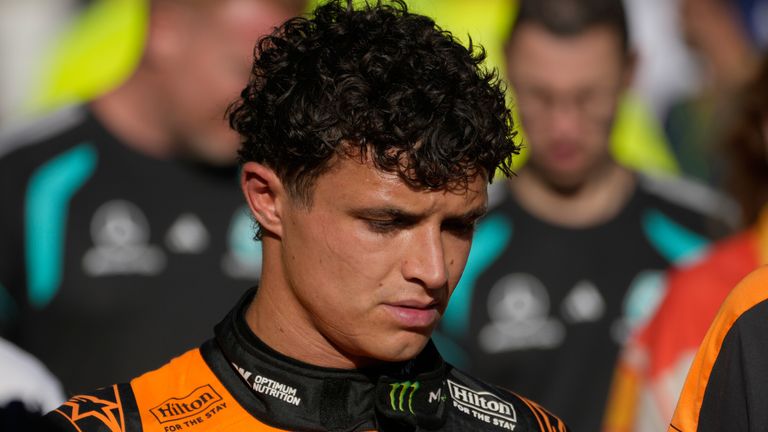 McLaren driver Lando Norris of Britain walks down pit lane following his crash during the Azerbaijan F1 Grand Prix auto race, in Baku, Azerbaijan, Saturday, Sept. 26, 2026. (AP Photo/Pavel Bednyakov)