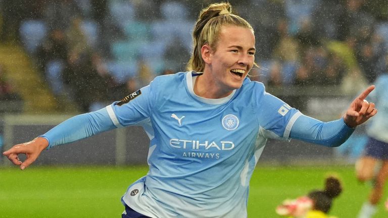 Lauren Hemp celebrates after opening the scoring for Man City against Liverpool in the WSL