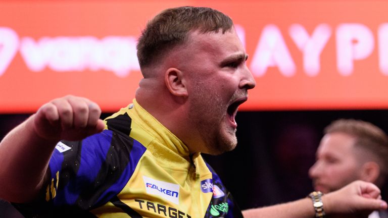 Luke Littler reacted to the crowd during the match (PDC/Kelly Deckers)