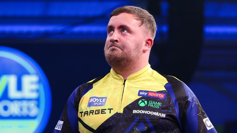 Luke Littler was beaten by Luke Woodhouse in the first round of the World Grand Prix on Monday (credit: Kieran Cleeves/PDC)