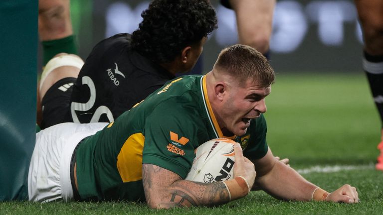 South Africa's hooker Malcolm Marx celebrates after scoring a try during the third Rugby's Greatest Rivalry international rugby union match between South Africa and New Zealand at the FNB Stadium in Johannesburg, on September 5, 2026. (Photo by GIANL