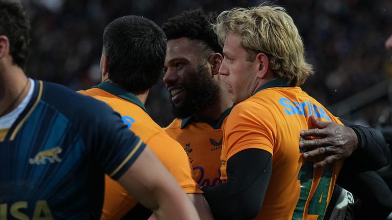 Australia's Max Jorgensen celebrates his try