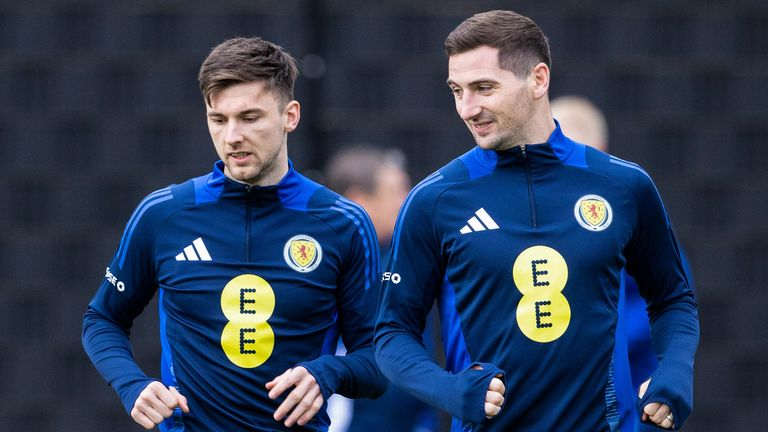 GLASGOW, SCOTLAND - MARCH 17: Kieran Tierney (L) and Kenny McLean (R) during a Scotland training session at the City Stadium, on March 17, 2025, in Glasgow, Scotland. (Photo by Alan Harvey / SNS Group)