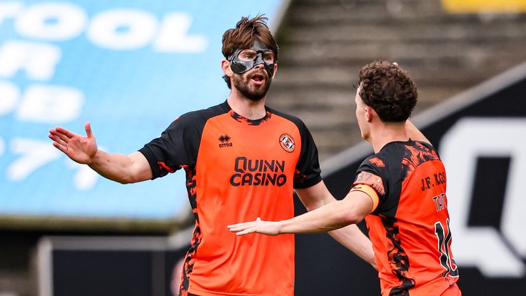 Dundee United's Michael Forbes (L) celebrates scoring the equaliser late on