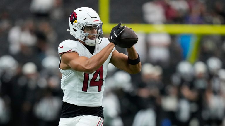 Arizona Cardinals wide receiver Michael Wilson (14) warms up before a preseason NFL football game against the Las Vegas Raiders, Thursday, Aug. 13, 2026, in Las Vegas. (AP Photo/John Locher)