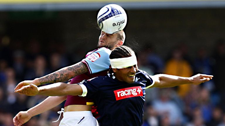 West Ham's Henri Lansbury in action with Millwall's Tamika Mkendawire during the 0-0 draw between the sides in September 2011