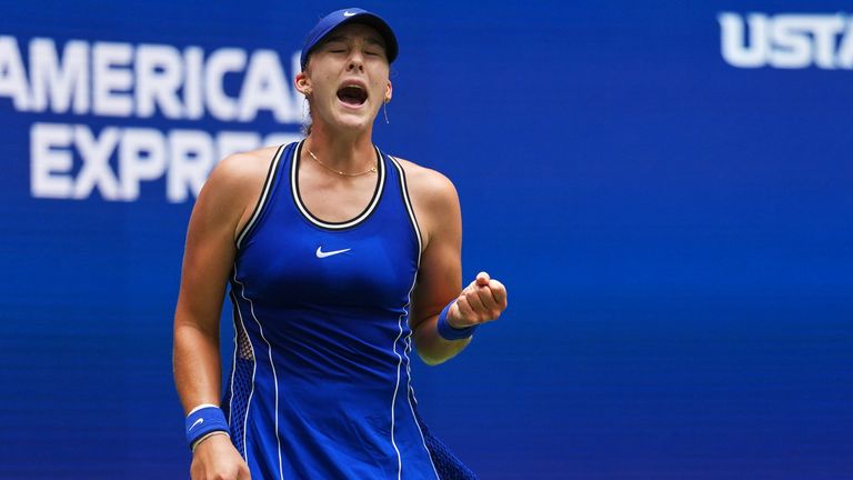 Mirra Andreeva, of Russia, reacts during a match against Coco Gauff, of the United States, during the quarterfinal round of the U.S. Open te