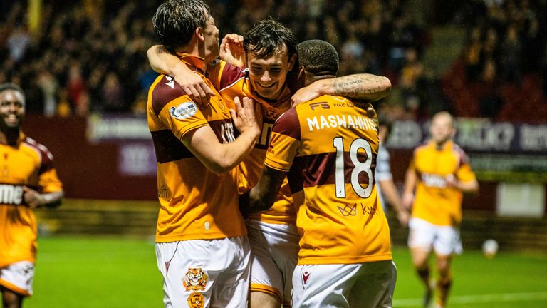 Motherwell's players celebrate their win over Dundee United