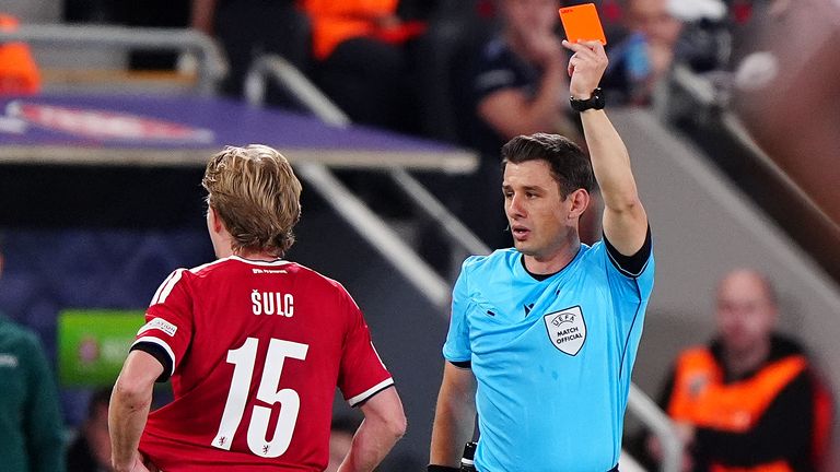 Czech Republic's Pavel Sulc is shown a red card by Halil Meler  against England