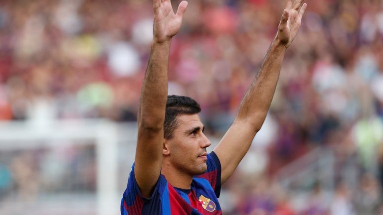 Barcelona's Rodri waves ahead the Joan Gamper Trophy