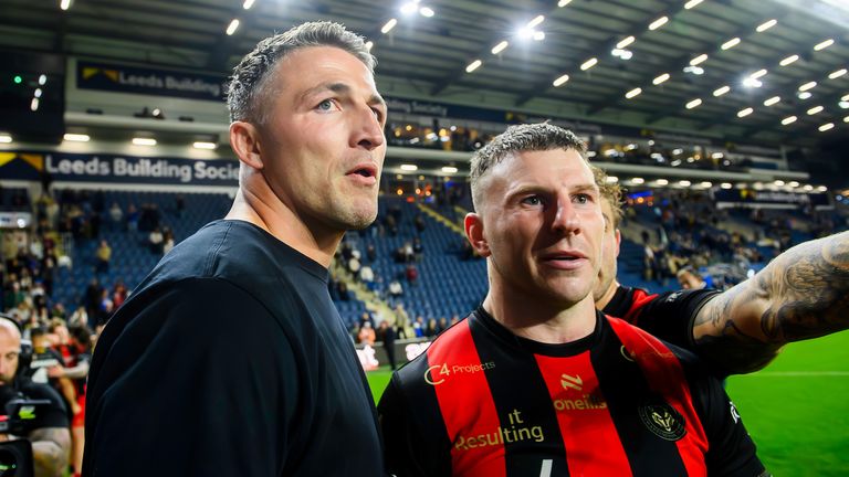 Picture by Allan McKenzie/SWpix.com - 25/09/2026 - Rugby League - Betfred Super League Semi Final - Leeds Rhinos v Warrington Wolves - AMT Headingley, Leeds, England - Warrington's coach Sam Burgess and George Williams celebrate after victory over Leeds.