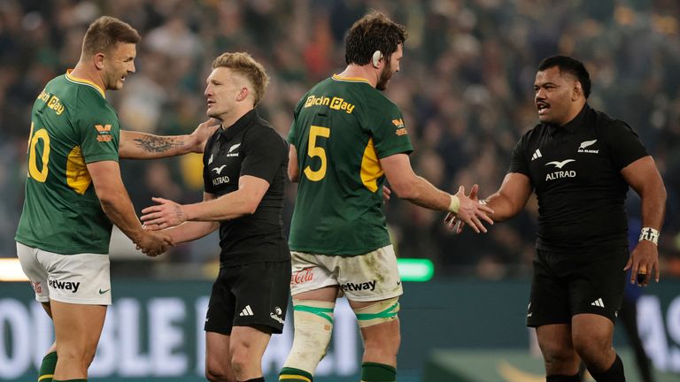 South African and New Zealand players greet each other at the end of the third Rugby's Greatest Rivalry international rugby union match between South Africa and New Zealand at the FNB Stadium in Johannesburg, on September 5, 2026. (Photo by PHILL MAG