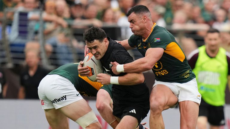 New Zealand's..Will Jordan is tackled by South Africa's Jesse Kriel, right, during their rugby international in Baltimore, USA, Saturday, Sept. 12, 2026. (AP Photo/Stephanie Scarbrough)