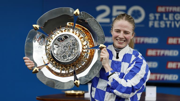 Osborne lifts the Leger trophy at Doncaster