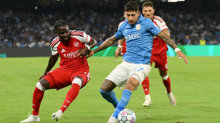 Arsenal's Bukayo Saka (left) and Napoli's Mathias Olivera battle for the ball during the UEFA Champions League, league phase match at the St