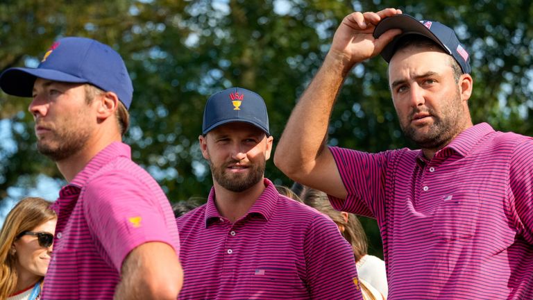 From left: USA teams' Sam Burns, Wyndham Clark and Scottie Scheffler watch plays on the 16th hole against the International team 