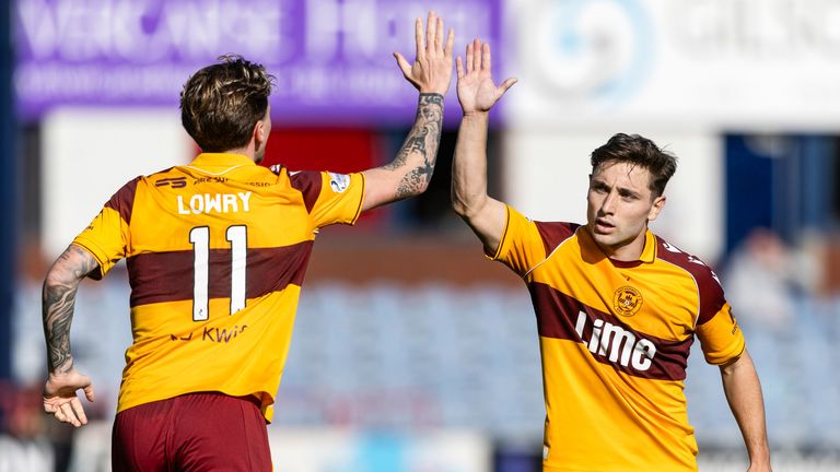 Motherwell's Alex Lowry (L) celebrates with Joe Hodge after scoring 