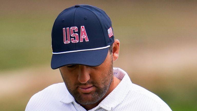 USA teams' Scottie Scheffler practices on the third hole prior to the start of the Presidents Cup golf tournament against the Internationals