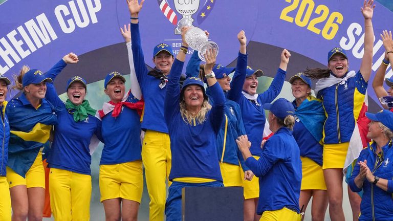 Anna Nordqvist Europe team captain holds the trophy aloft after her team won the Solheim Cup