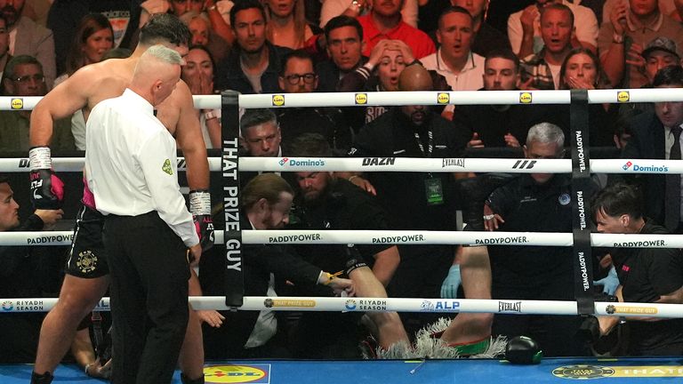 OUCH! Carty lands on his head and shoulder outside the ring.