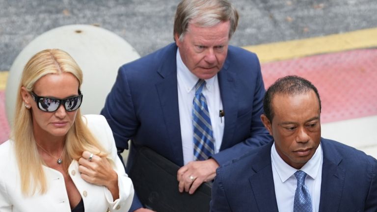 Woods arrived at court with girlfriend Vanessa Trump 