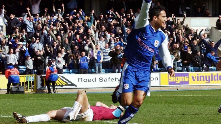 Tim Cahill celebrates after West Ham United's Christian Dailly scores an own goal during the 4-1 win for Millwall in March 2004
