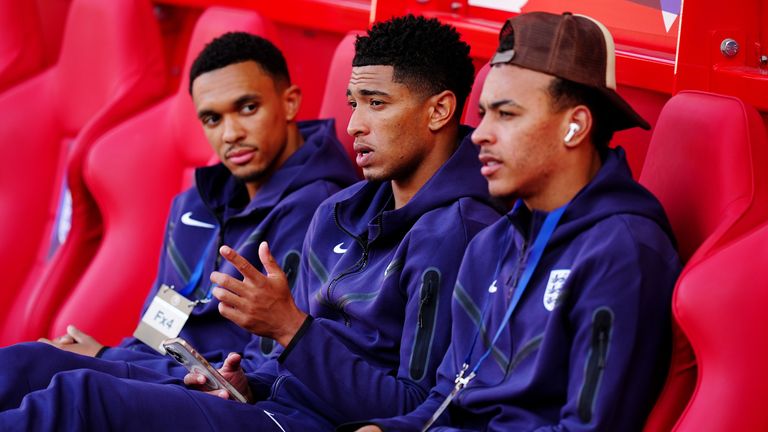 Trent Alexander-Arnold (left) pictured with Jude Bellingham and Morgan Rogers