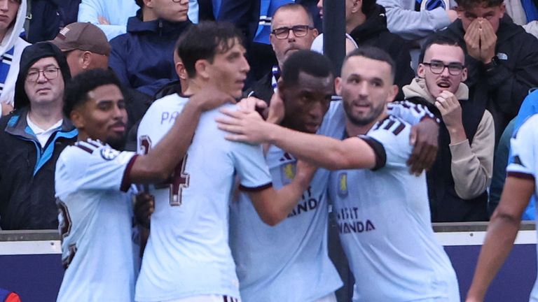 Aston Villa's Nicolas Jackson celebrates with his teammates after scoring his side's third goal 