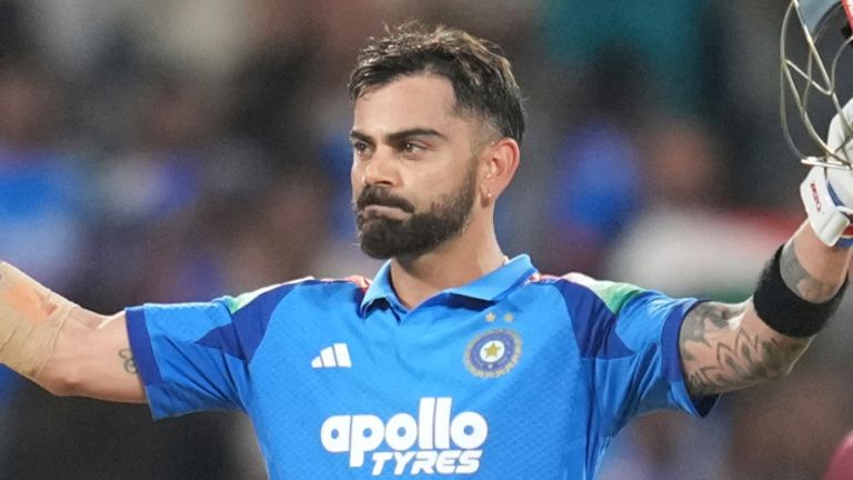 India's Virat Kohli celebrates his century during the first one day international cricket match between India and West Indies in Thiruvananthapuram, India, Sunday, Sept. 27, 2026. (AP Photo/ Rafiq Maqbool)