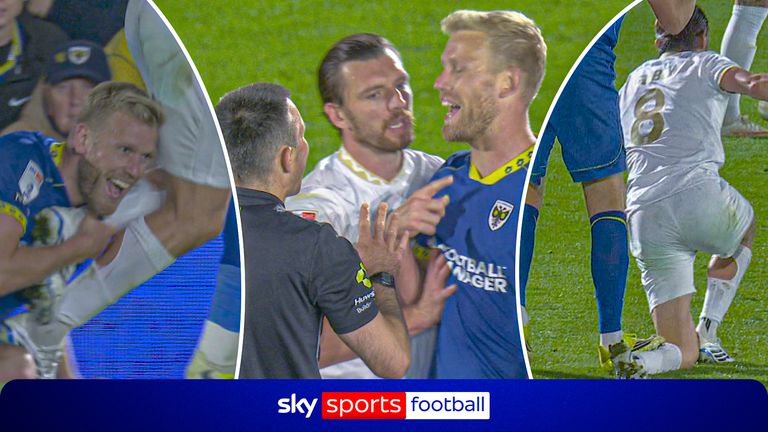 Players clash in League One.