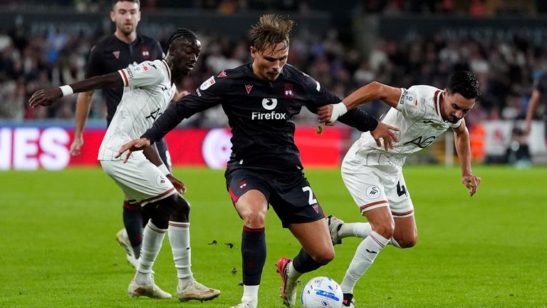 Swansea missed out on a chance to go top of the Championship with a draw against Wrexham