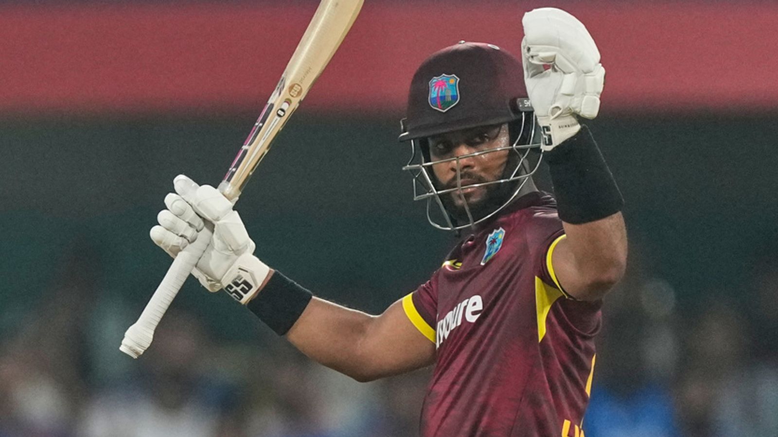 West Indies' captain Shai Hope celebrates his century during the second T20 against India