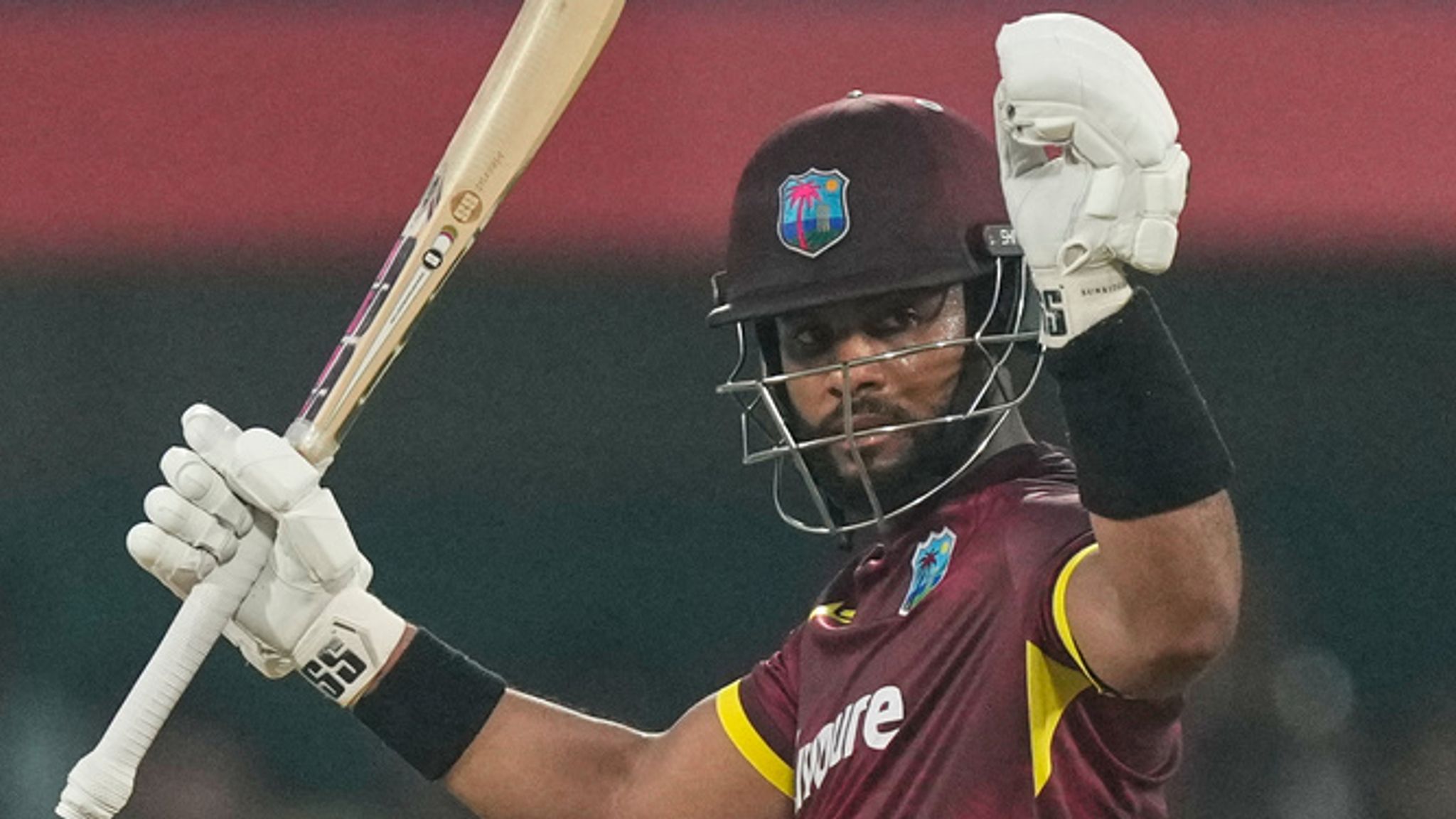 West Indies' captain Shai Hope celebrates his century during the second T20 against India