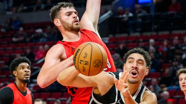 Portland Trail Blazers center Donovan Clingan pressures London Lions forward Joel Scott (AP Photo/Molly J. Smith)