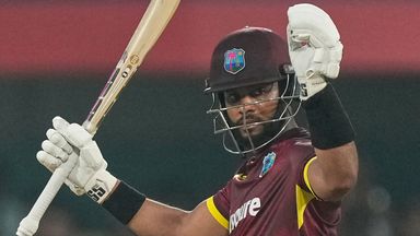 West Indies' captain Shai Hope celebrates his century during the second T20 against India