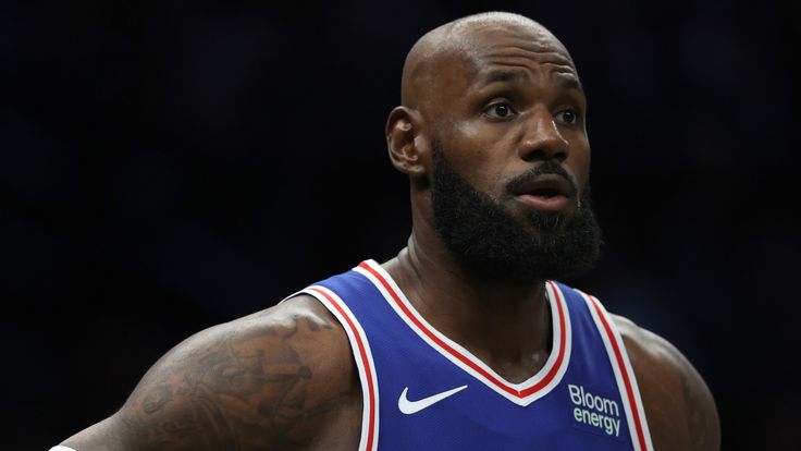 Philadelphia 76ers' LeBron James looks on during the first half of a preseason NBA basketball game against the Brooklyn Nets, Thursday, Oct. 8, 2026, in New York. (AP Photo/Pamela Smith)