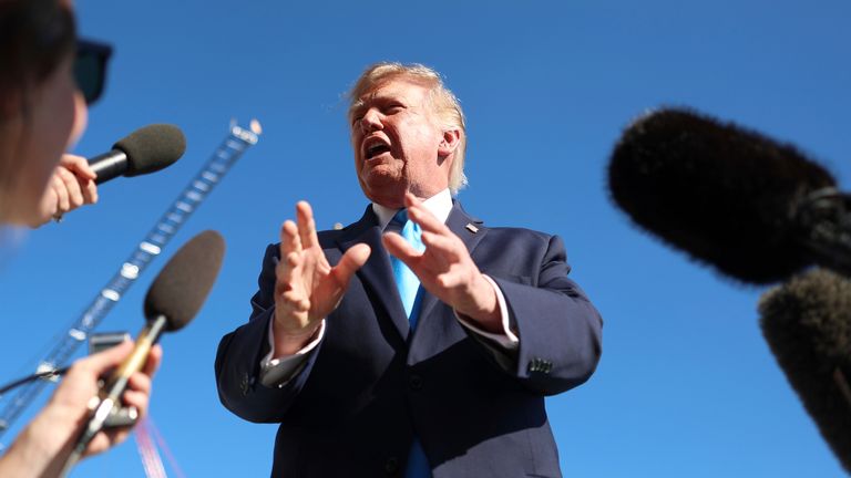 President Donald Trump speaks to reporters. Pic: AP