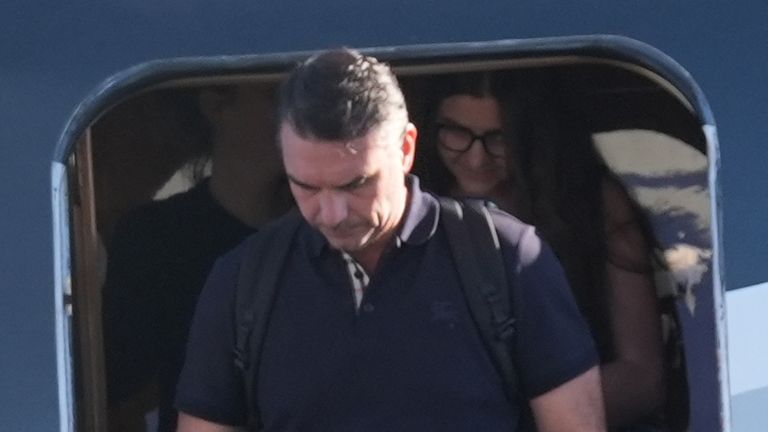 Flavio Bolsonaro arrives at an airport in Florida. Pic: AP
