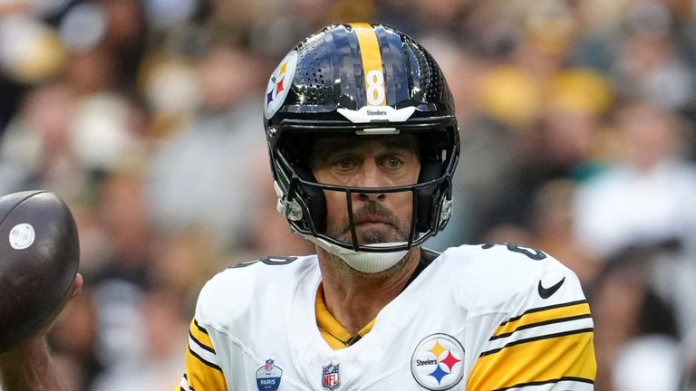 Pittsburgh Steelers quarterback Aaron Rodgers (8) looks to pass during an NFL football game against New Orleans Saints in Saint-Denis, outside Paris, Sunday, Oct. 25, 2026. (AP Photo/Aurelien Morissard)
