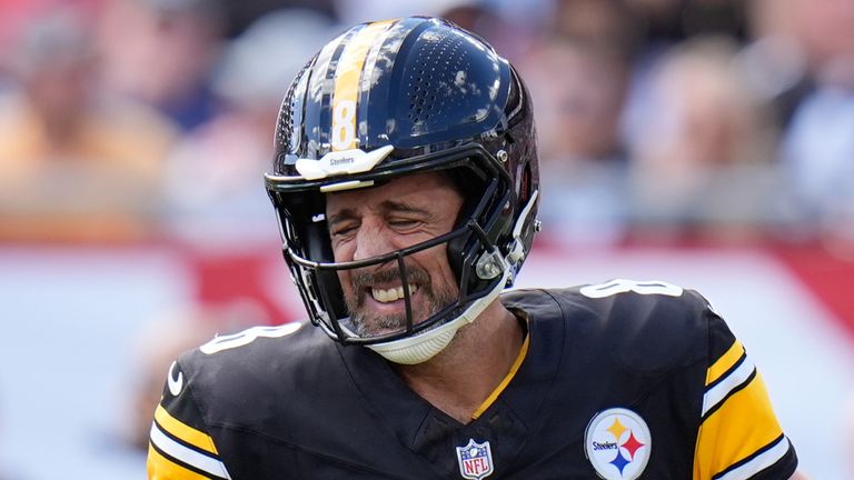 Pittsburgh Steelers quarterback Aaron Rodgers (8) grimaces after he was sacked during the first half of an NFL football game against the Tampa Bay Buccaneers in Tampa, Fla., Sunday, Oct. 18, 2026. (AP Photo/Chris O'Meara)