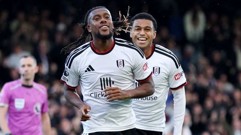 Alex Iwobi wheels away to celebrate after giving Fulham a first-half lead against Hull