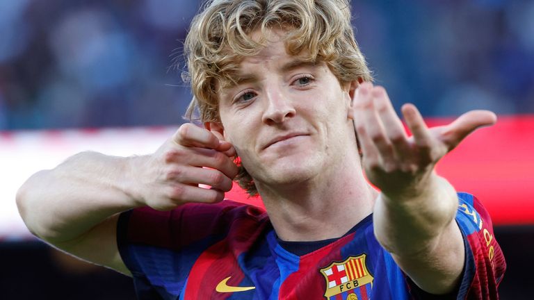 Barcelona's Anthony Gordon celebrates after scoring his side's opening goal during the Spanish La Liga soccer match between Barcelona and Getafe in Barcelona, Spain, Saturday, Oct. 10, 2026. (AP Photo/Joan Monfort)