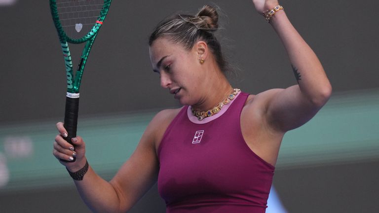 Aryna Sabalenka, of Belarus, reacts during the third round of the women's singles match against Nikola Bartunkova, of the Czech Republic, at the China Open tennis tournament in Beijing, Sunday, Oct. 4, 2026. (AP Photo/Achmad Ibrahim)