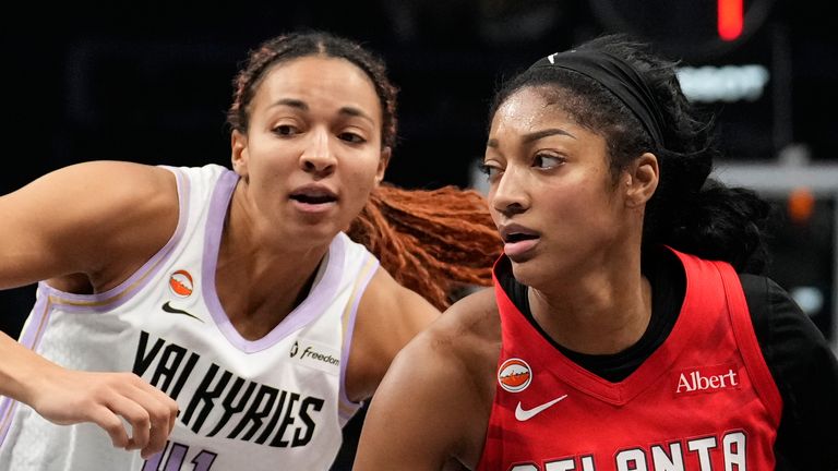 Atlanta Dream's Angel Reese (5) goes up to shoot against Golden State Valkyries' Kiah Stokes