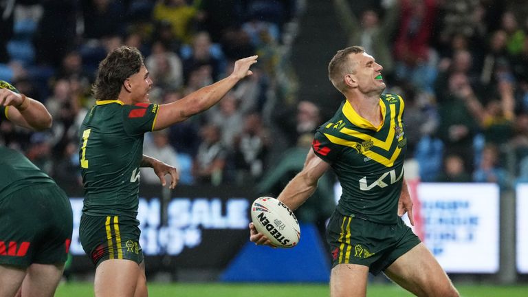 Australian players celebrate after their win in the opening game of the Rugby League World Cup against New Zealand in Sydney, Thursday, Oct. 15, 2026. (AP Photo/Mark Baker)
