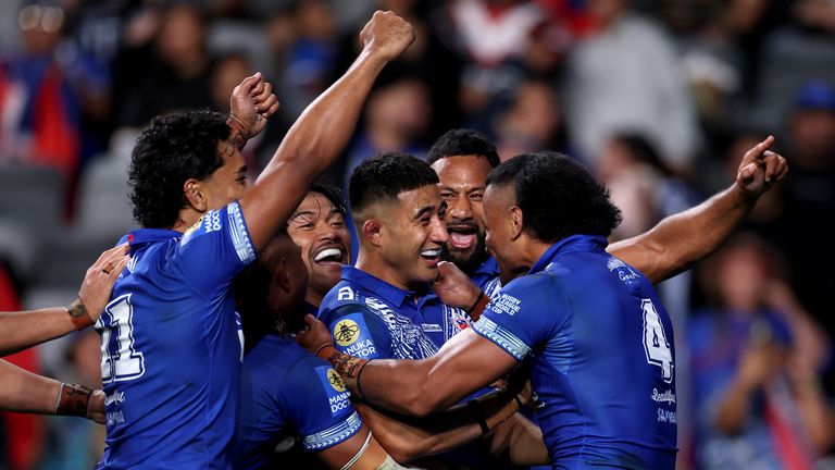 Benaiah Ioelu of Samoa celebrates after scoring a try during the 2026 Men's Rugby League World Cup match between Samoa and France at CommBan